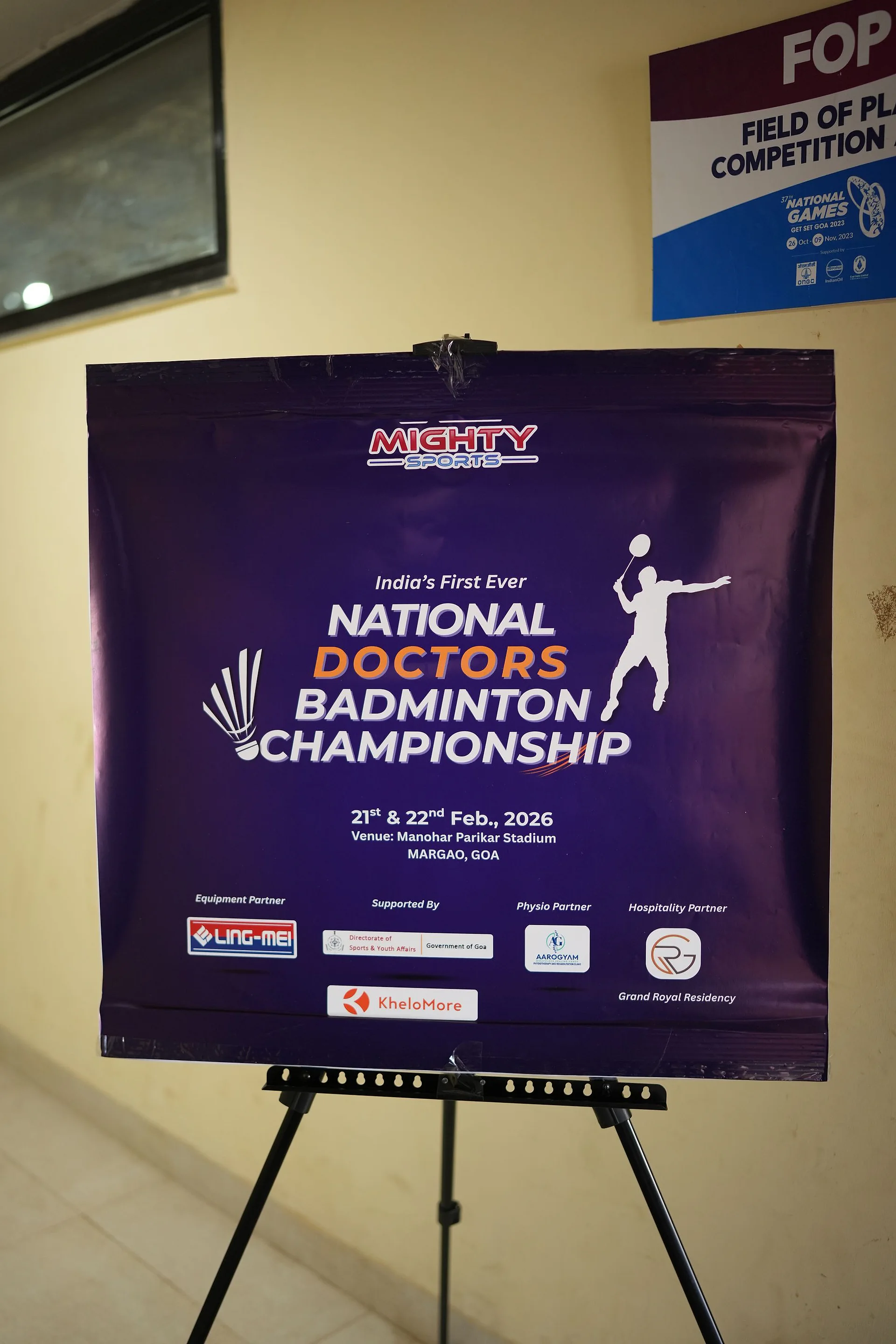 The National Doctors Badminton Championship sign on an easel at the venue